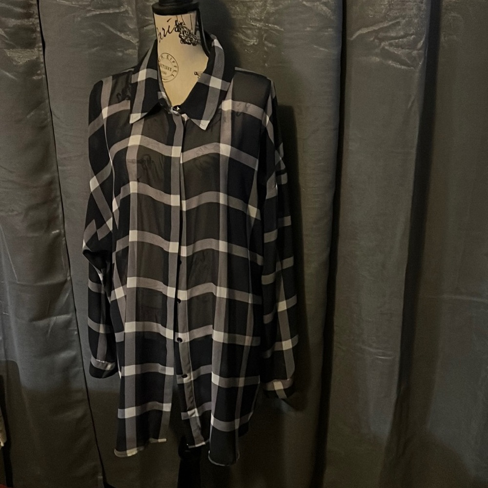 Navy Blue and white, see-through button-up shirt.